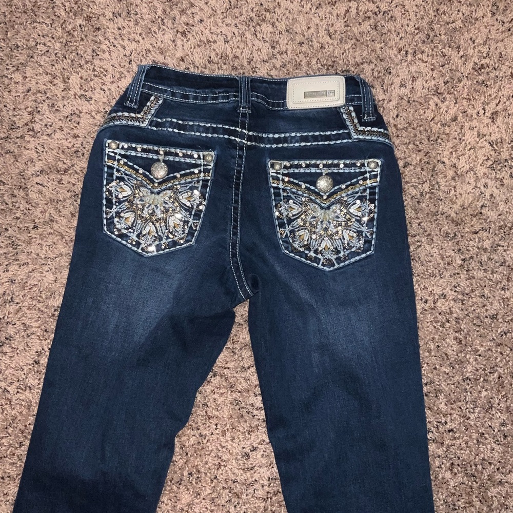 Woman book cut jeans